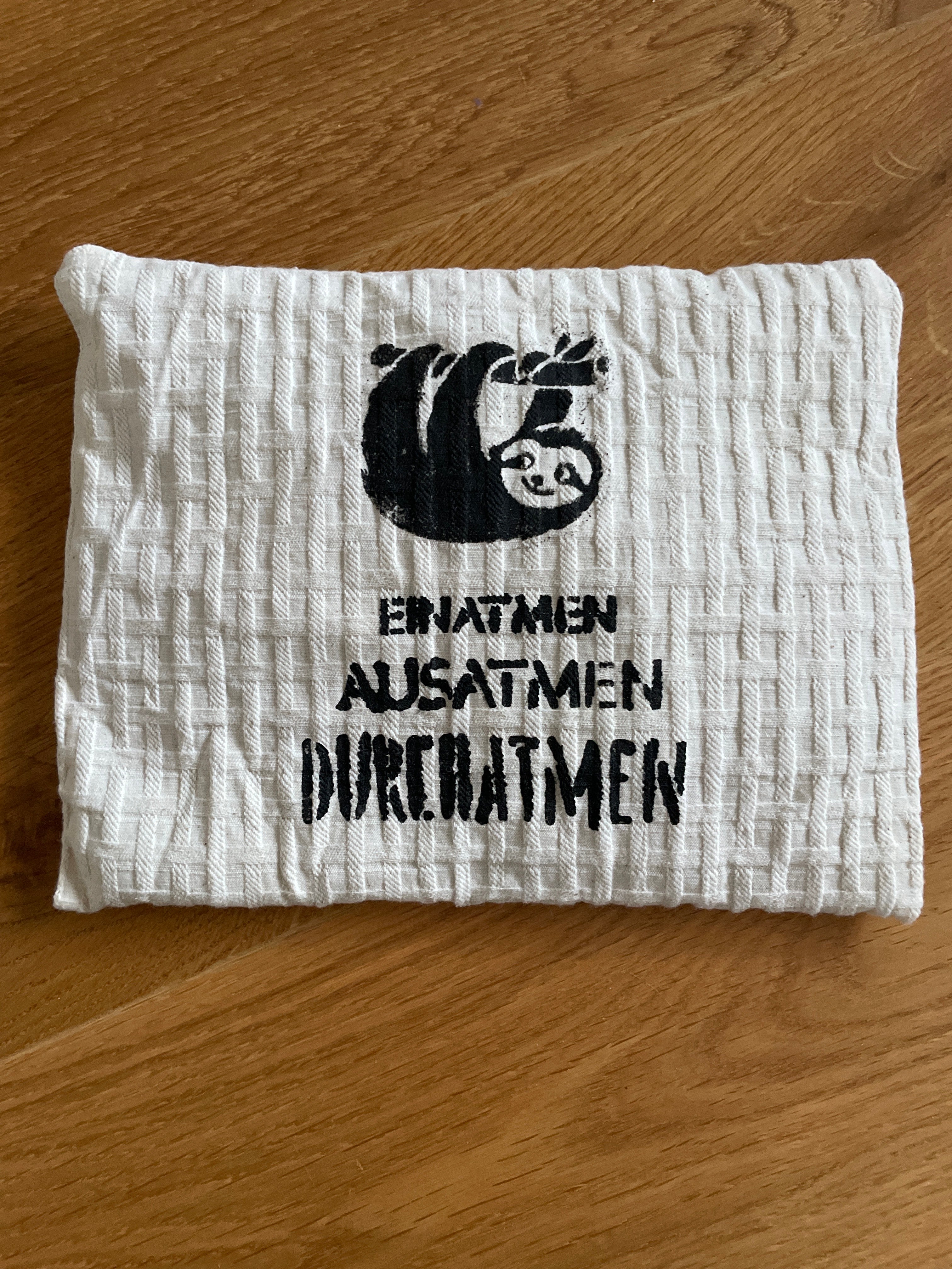 Kirschkernkissen Einatmen AusatmenDurchatmen Faultier