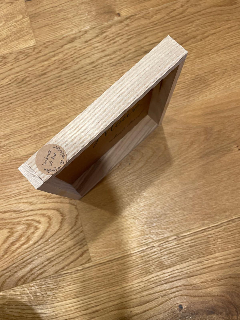 Klötzchen Spruch auf DesignPapier im Holzsticks Rahmen "Zuhause ist nicht nur ein Ort, es ist ein Gefühl!"