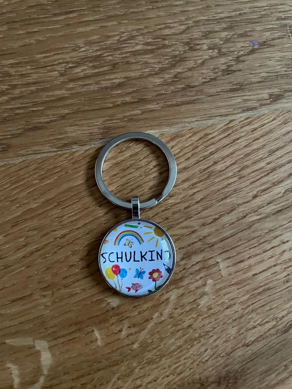 🎒 Schulkind Glasnugget-Schlüsselanhänger